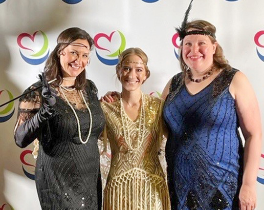 WorldPoint employees dressed up in 1920s costumes for a company event